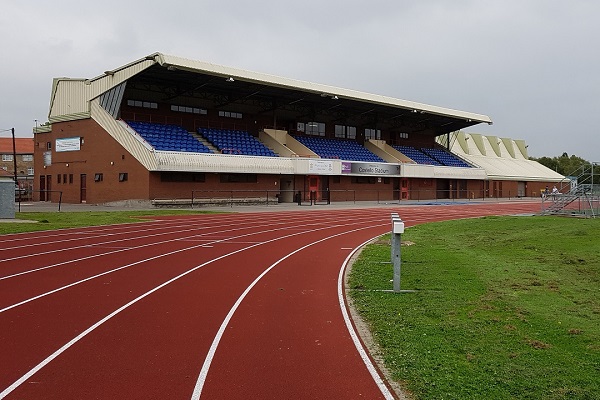 An image of the Costello Stadium running tack with the stand in the background