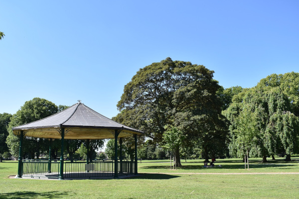 An image of the East Park bandstand in the sun