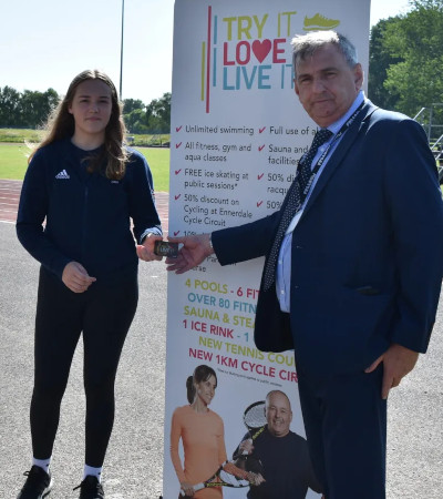 An image of Gracie being awarded membership through the Talented Athlete Scheme
