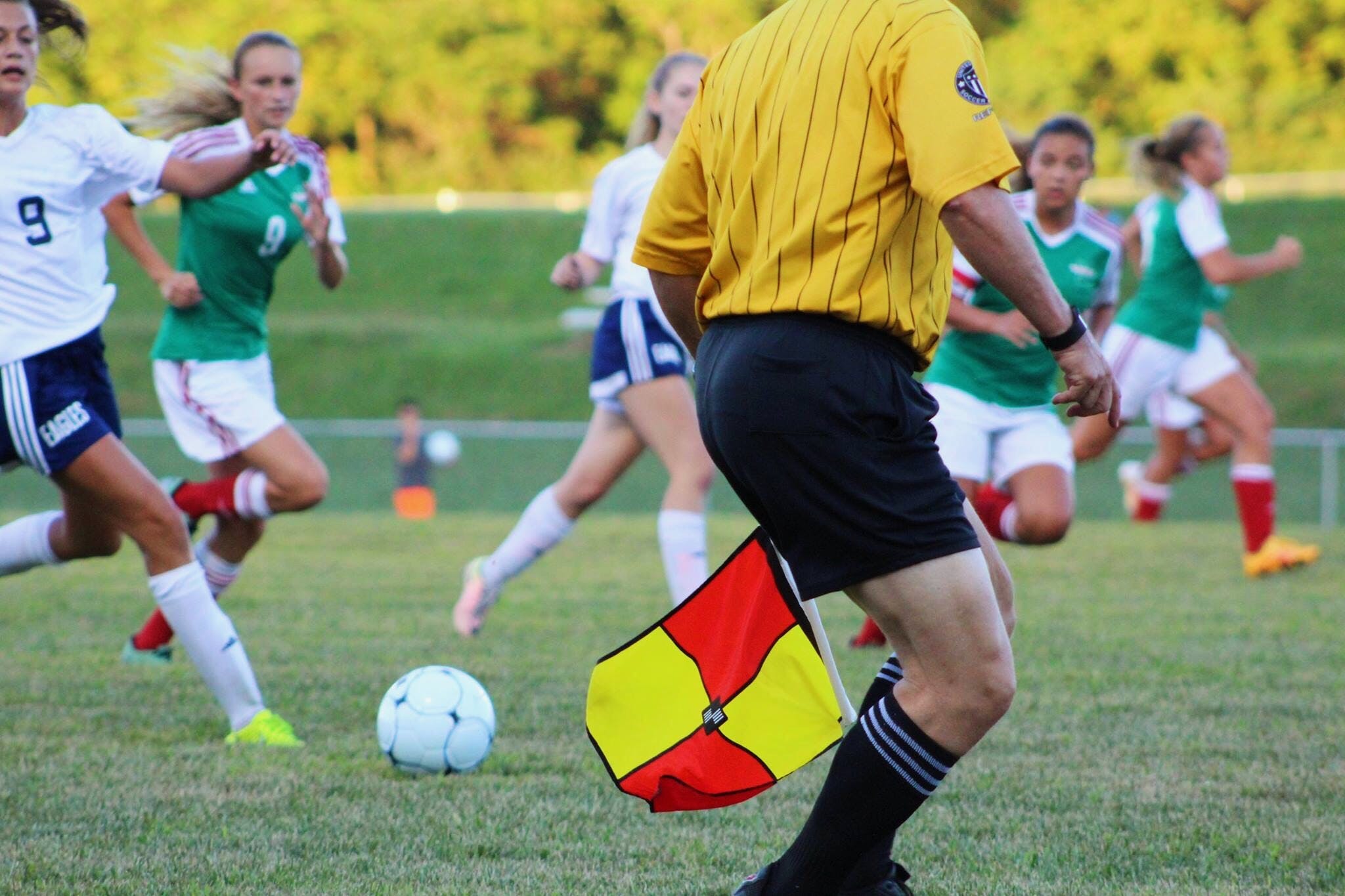 A photograph of a female football match