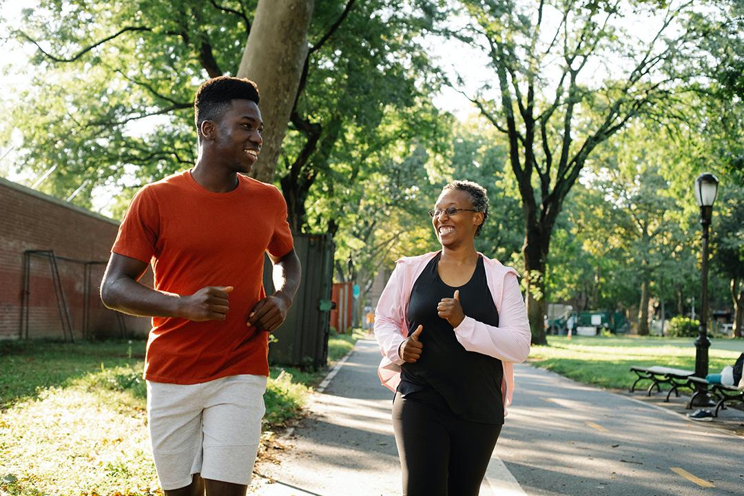 two people running