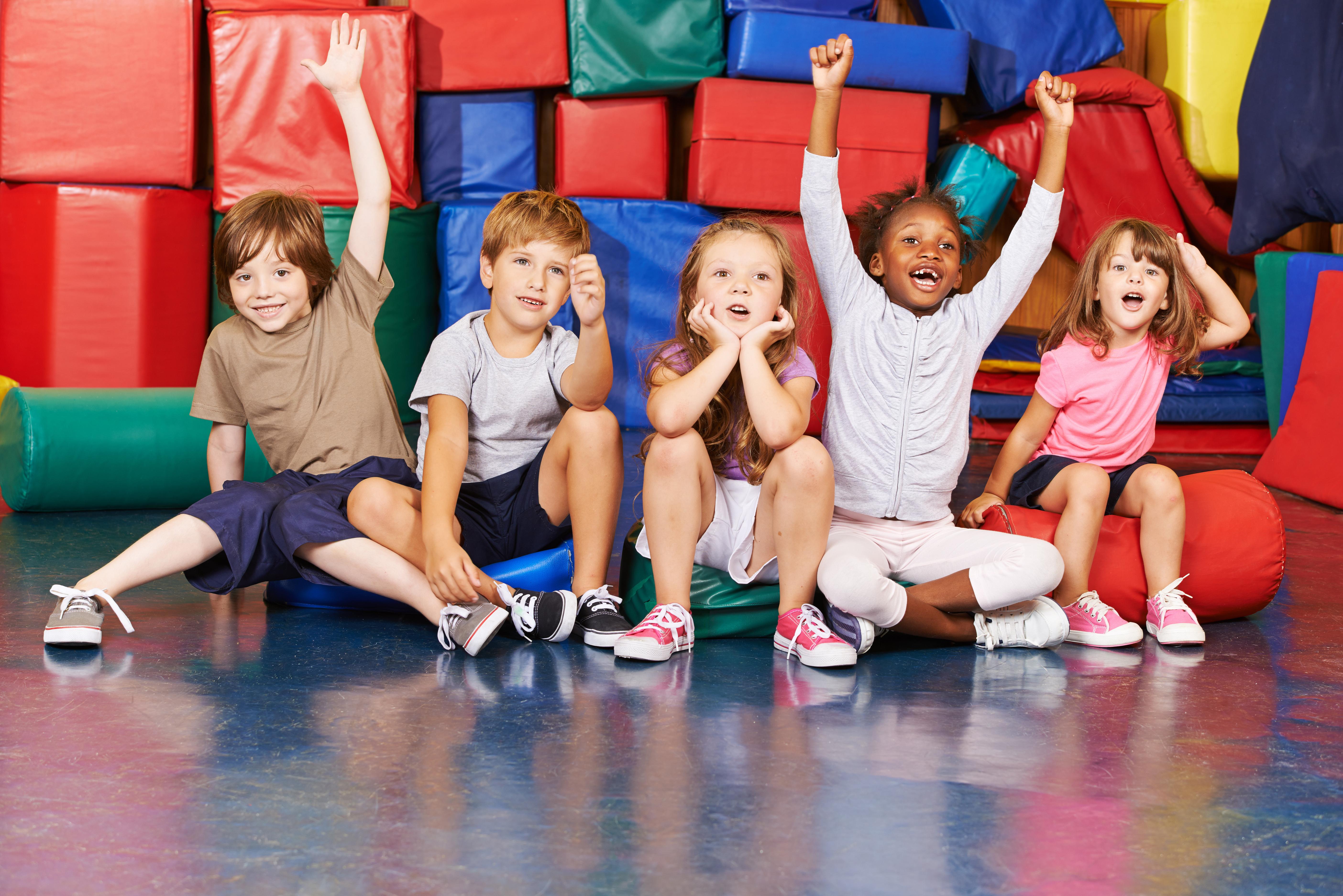Happy children at the pre-schools gymnastics session.