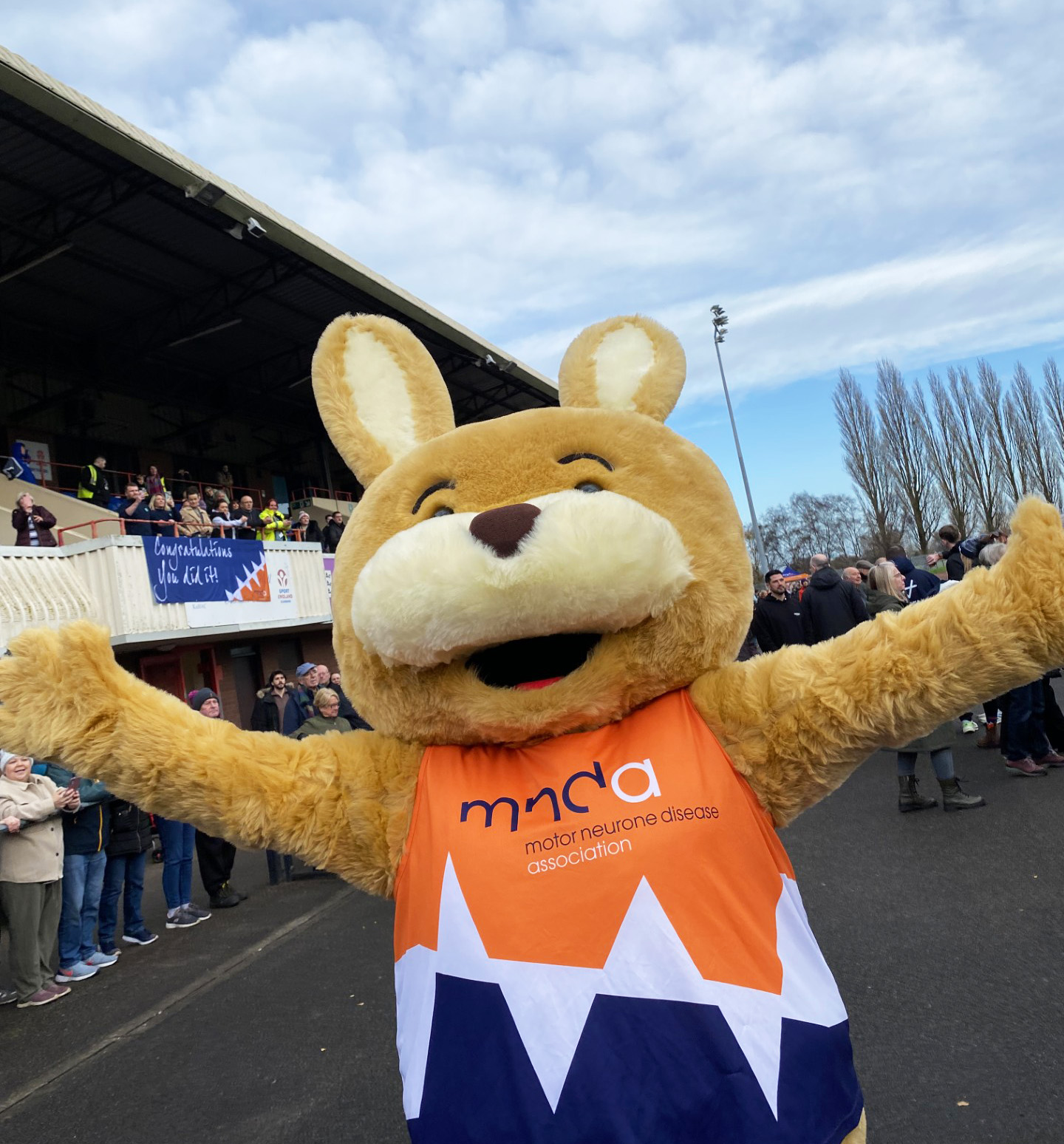 Image of the MNDA mascot for running event
